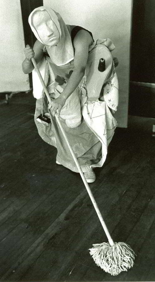 A Change of Face Handspan Theatre Body puppet with apron and broom sweeping